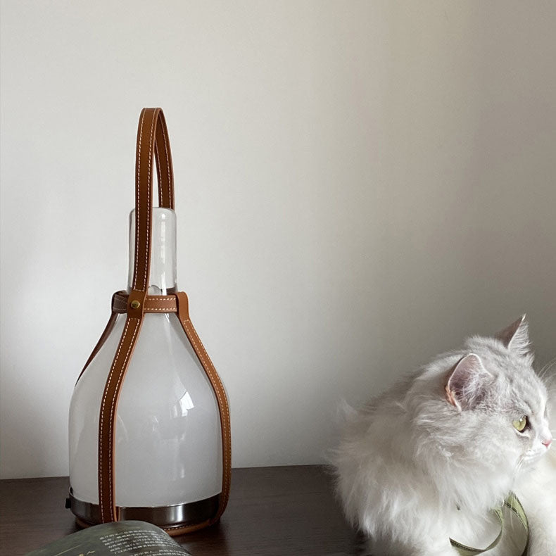 Lampada da tavolo in vetro portatile Bell in pelle