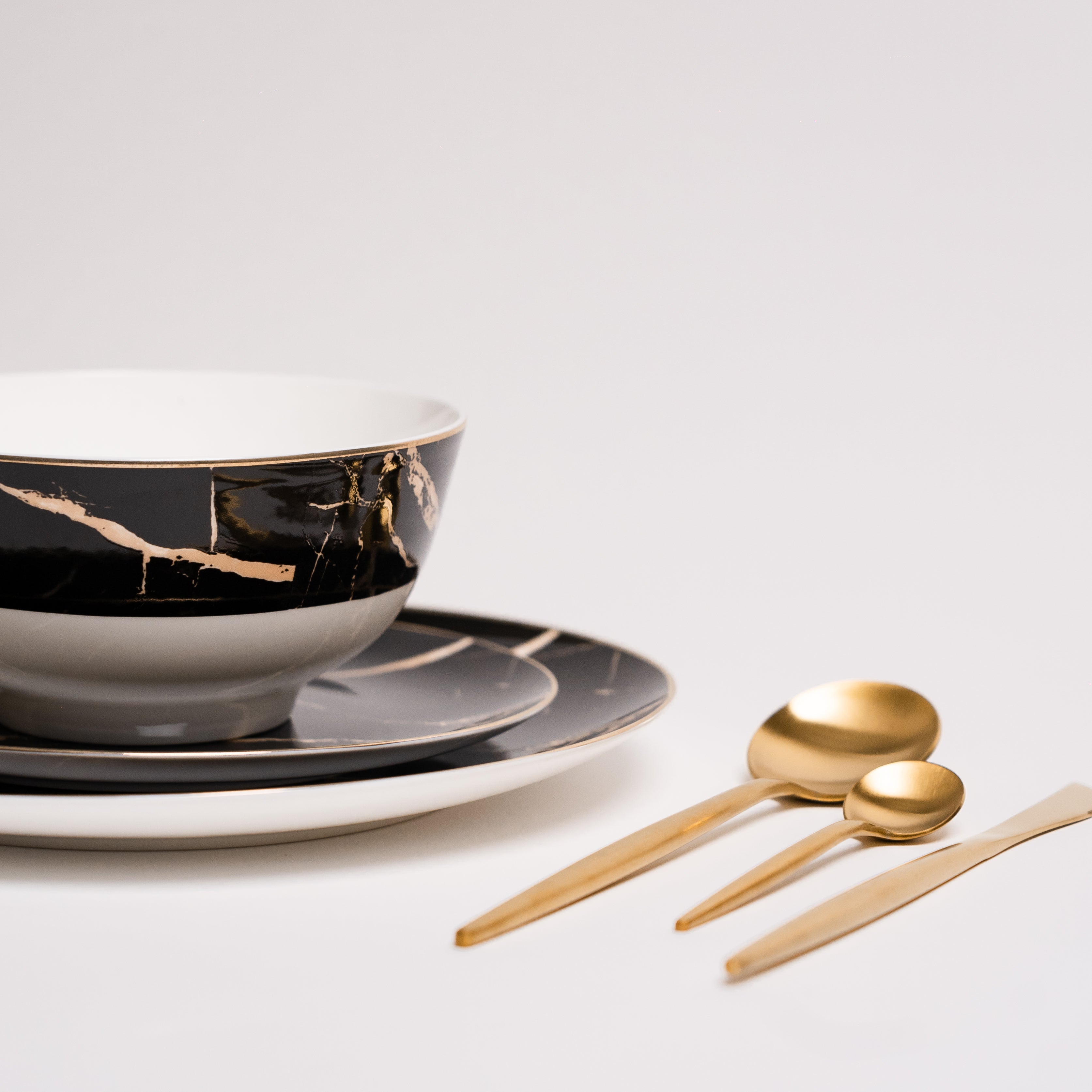 Set di Piatti in Marmo Nero Libra