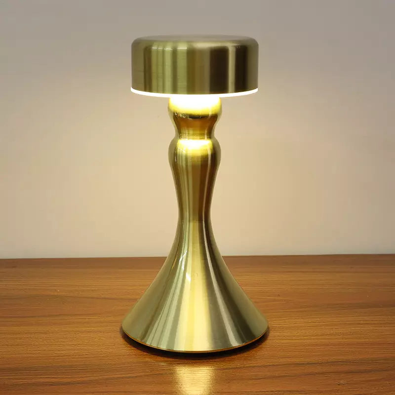 Lámpara de mesa inalámbrica de lujo con acabado dorado