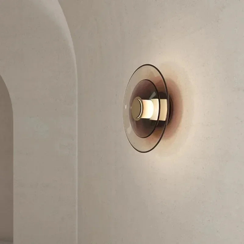 LumiDisc – Lampada da parete in vetro ambra per un'atmosfera calda