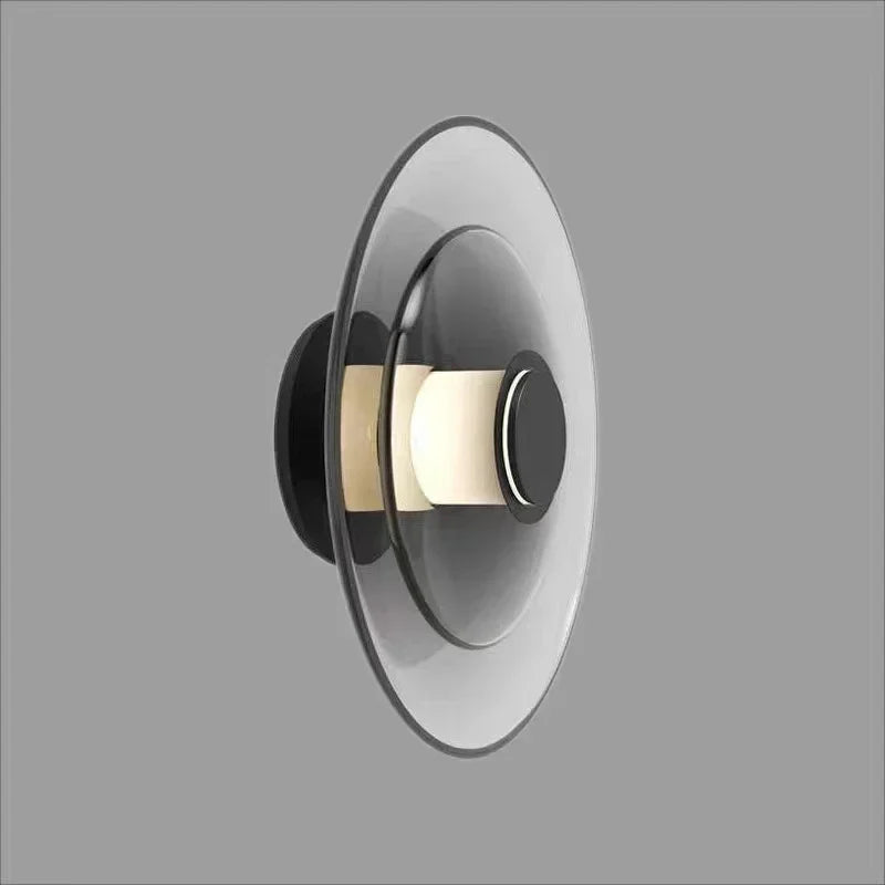 LumiDisc – Lampada da parete in vetro ambra per un'atmosfera calda
