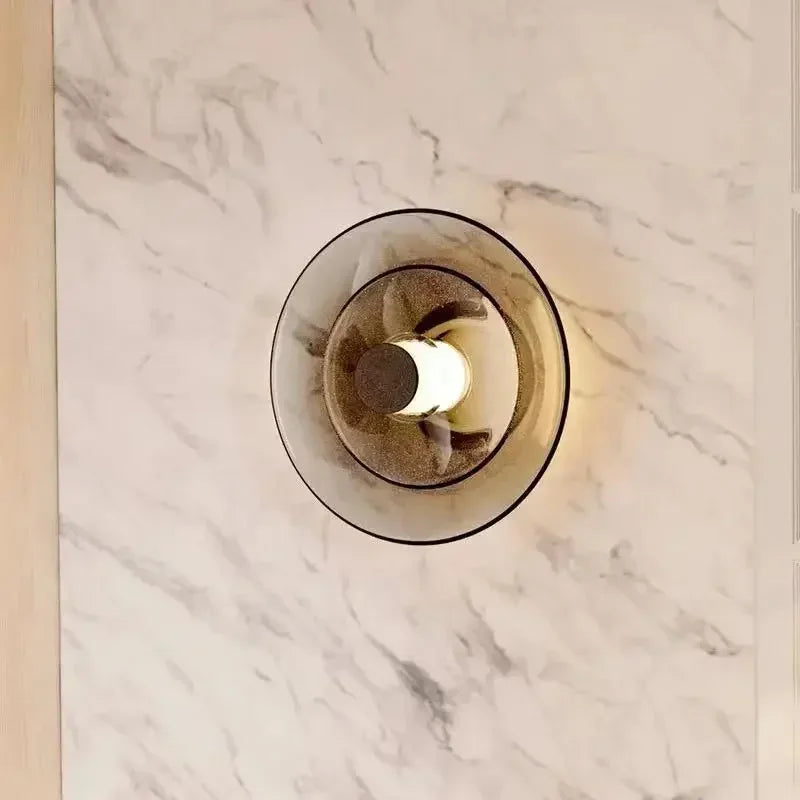 LumiDisc – Lampada da parete in vetro ambra per un'atmosfera calda