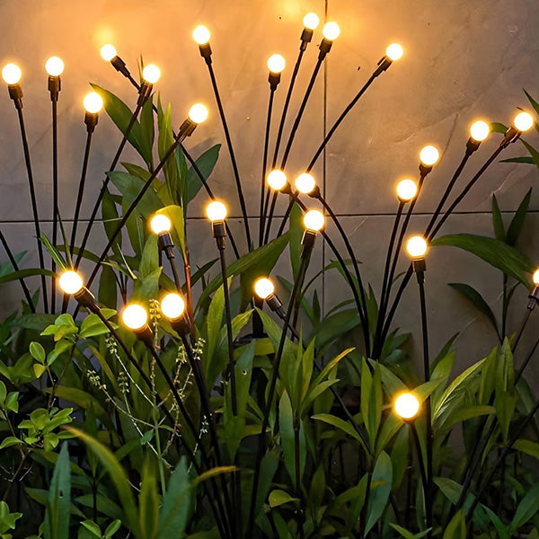 Iluminação solar de jardim - Luz giratória Starburst, a rodar com o vento