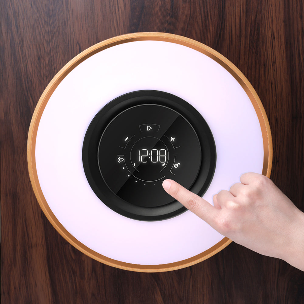 La lampada da tavolo Serie Moderna con altoparlante e caricatore wireless