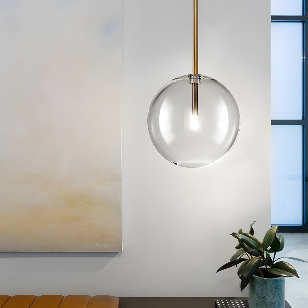 Lampada a sospensione con globo di vetro trasparente