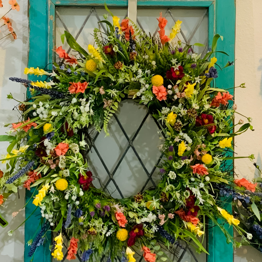 Ghirlanda primaverile decorativa floreale per porta