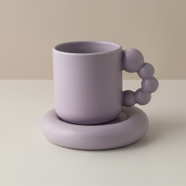 Tazza e piatto in porcellana fatti a mano